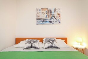 1 bedroom, desk, iron/ironing board, bed sheets