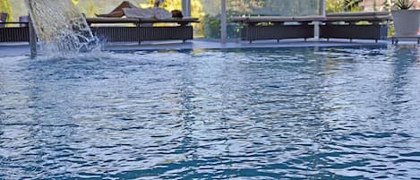 Indoor pool, pool umbrellas, sun loungers