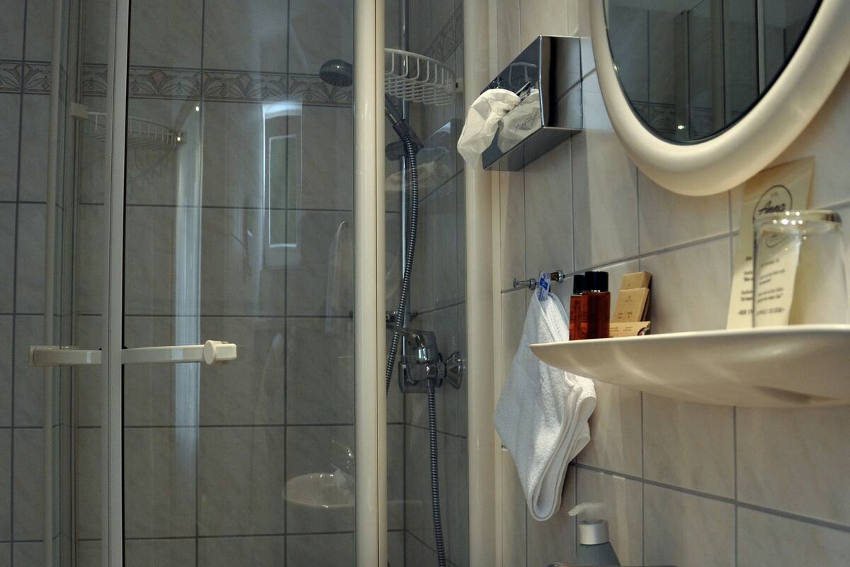 single room, 1 large single bed, non smoking | bathroom | deep-soaking bathtub, free toiletries, hair dryer, bathrobes