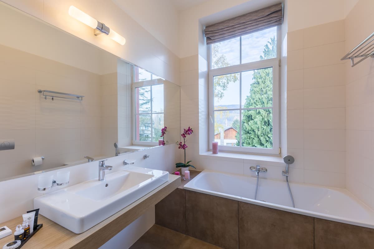 superior double room | bathroom | free toiletries, hair dryer, slippers, towels