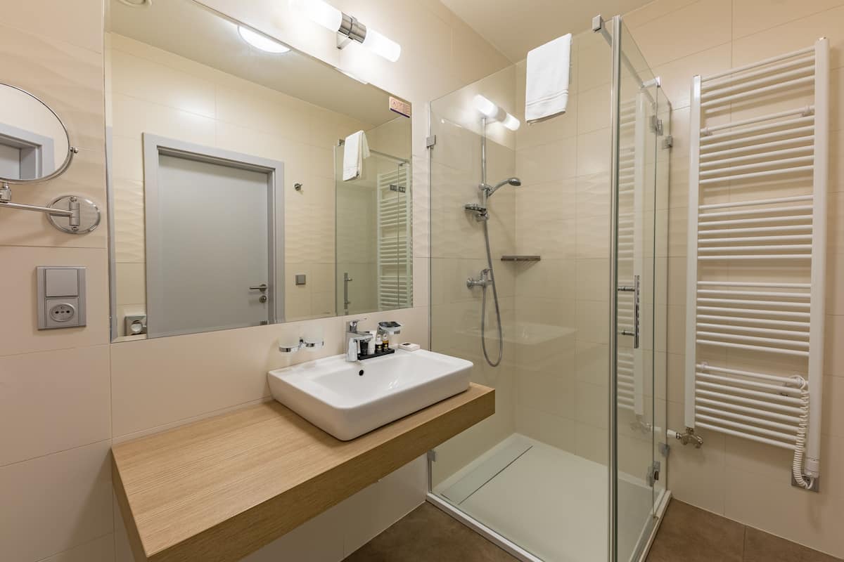 family suite | bathroom | free toiletries, hair dryer, slippers, towels