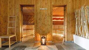 A wooden interior with a lantern, a ladder, and a bamboo planter.