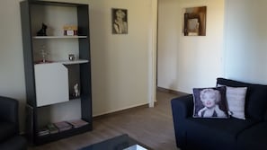 Apartamento | Sala de estar | TV de tela plana