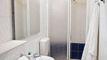 Suite, 1 Queen Bed, Non Smoking | Bathroom | Shower, free toiletries, hair dryer, towels