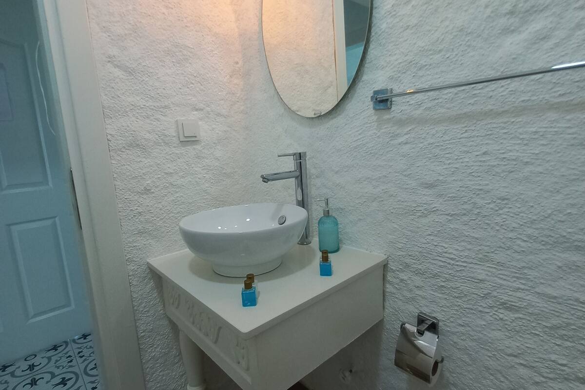 family room | bathroom | shower, rainfall showerhead, free toiletries, hair dryer