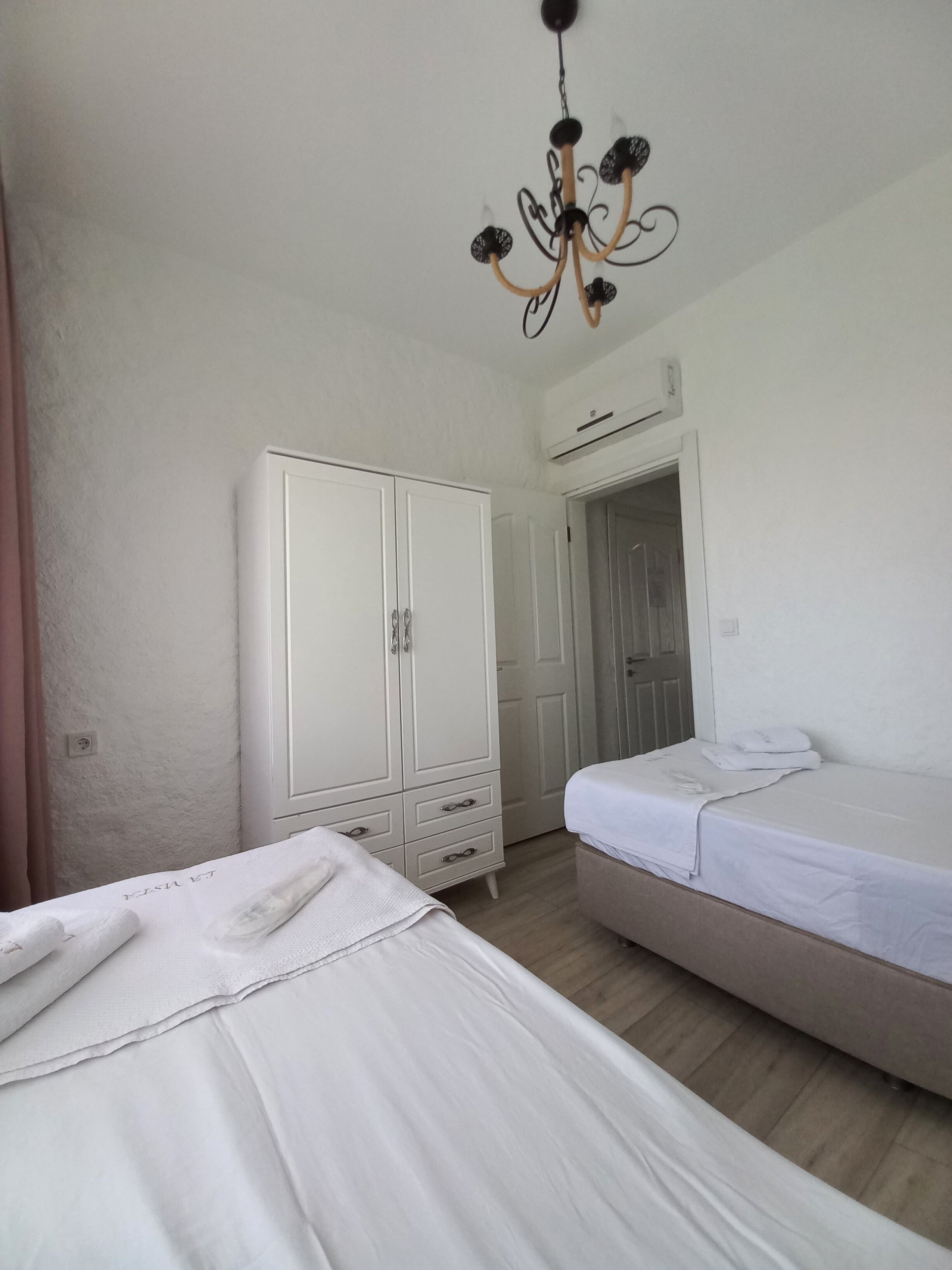 family room | premium bedding, soundproofing, free wifi, bed sheets