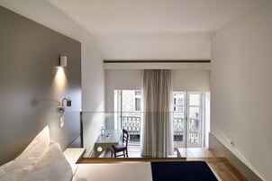 Ropa de cama de alta calidad y minibar 