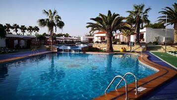 Outdoor pool, open 10 AM to 6 PM, pool umbrellas, sun loungers