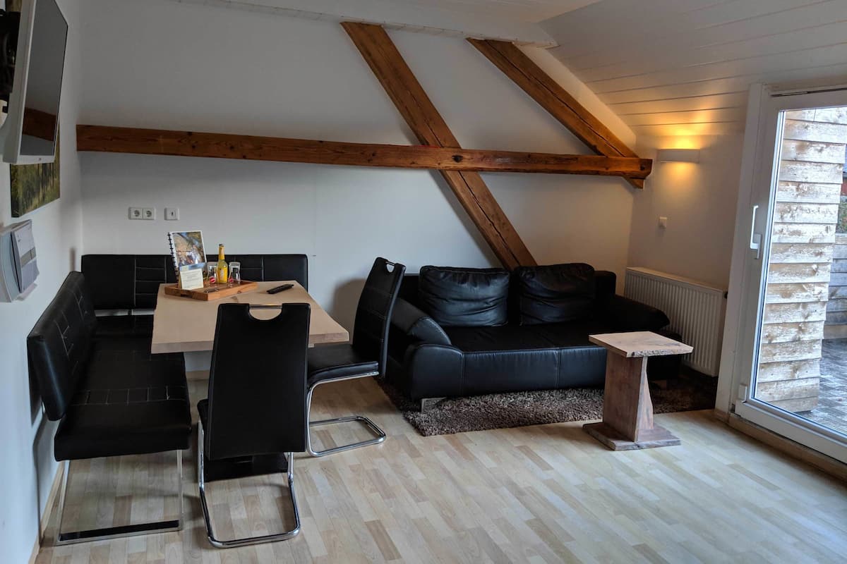Family Apartment, 2 Bedrooms, Courtyard View (Sonnenwinkel) | Living area | Flat-screen TV