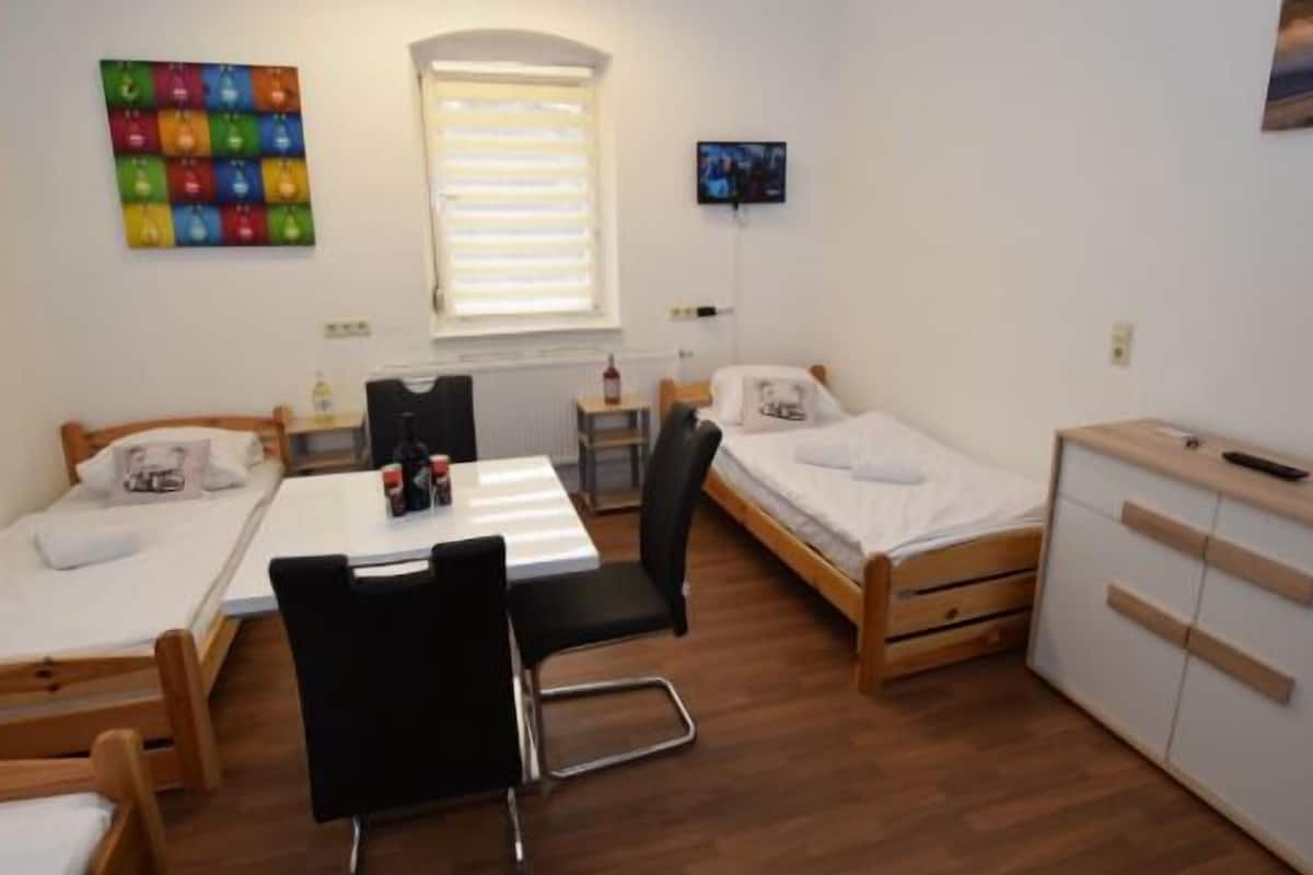 Desk, free WiFi, bed sheets