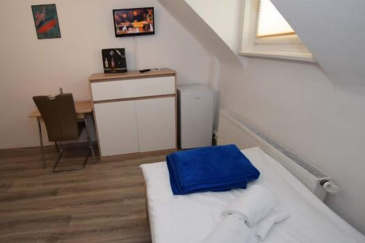 Desk, free WiFi, bed sheets