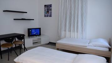 Apartment, 2 Bedrooms (54-00) | Desk, free WiFi, bed sheets