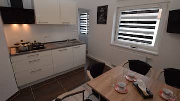 Apartment, 2 Bedrooms (95-00) | Private kitchen | Fridge, stovetop, dishwasher, coffee/tea maker