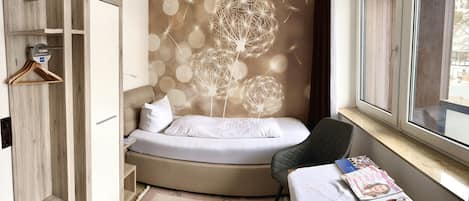 Desk, laptop workspace, free WiFi, bed sheets