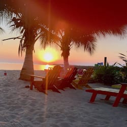 On the beach, sun-loungers, beach towels