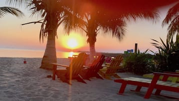 On the beach, sun-loungers, beach towels