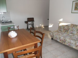 Apartamento, 1 quarto | Área de estar