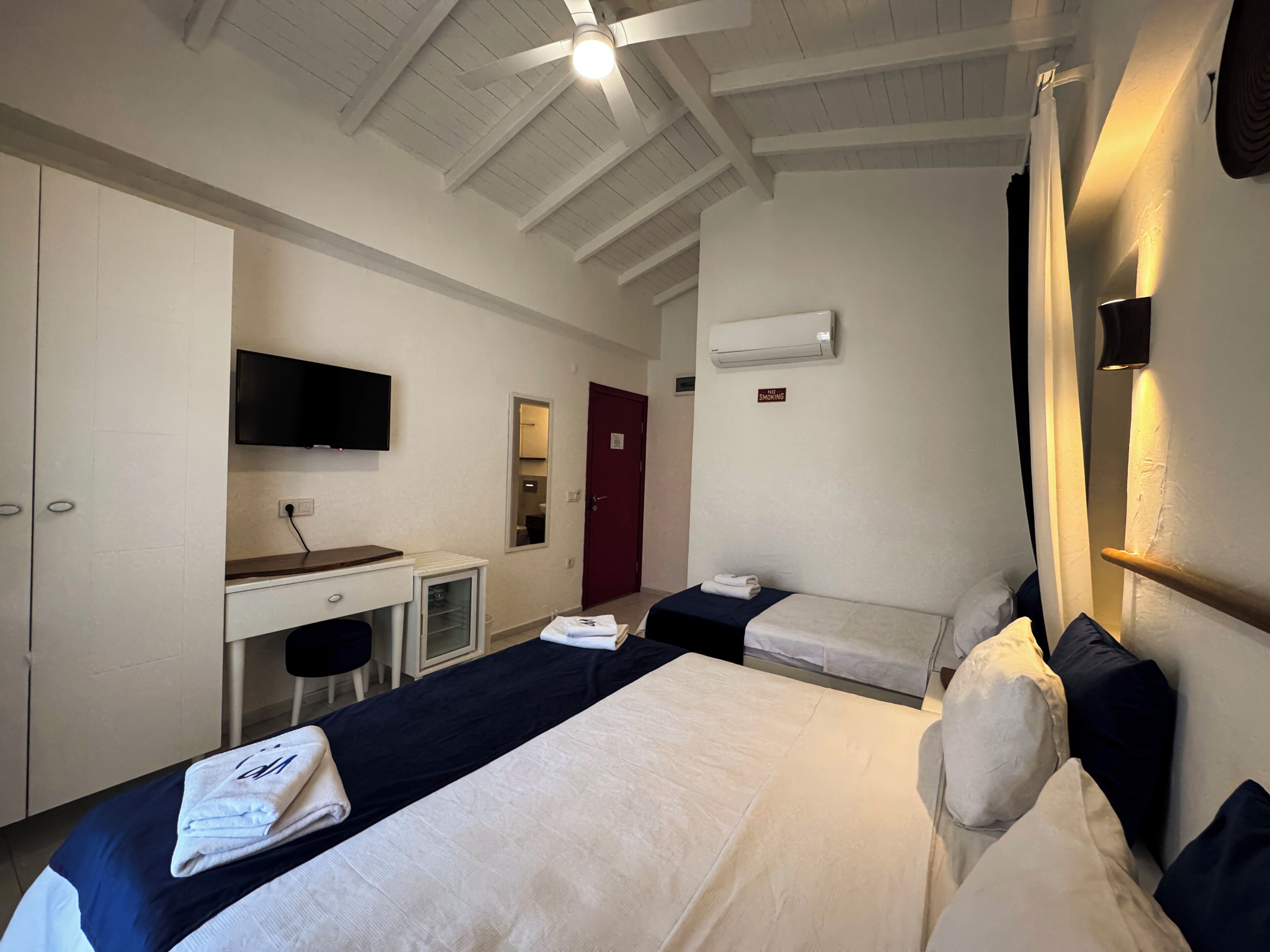Standard Triple Room | Premium bedding, down duvets, minibar, individually decorated