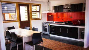 Apartment, 2 Bedrooms, Private Bathroom (8 PAX) | Private kitchen | Fridge, microwave, cookware/dishes/utensils - Mia Loft (Natales)