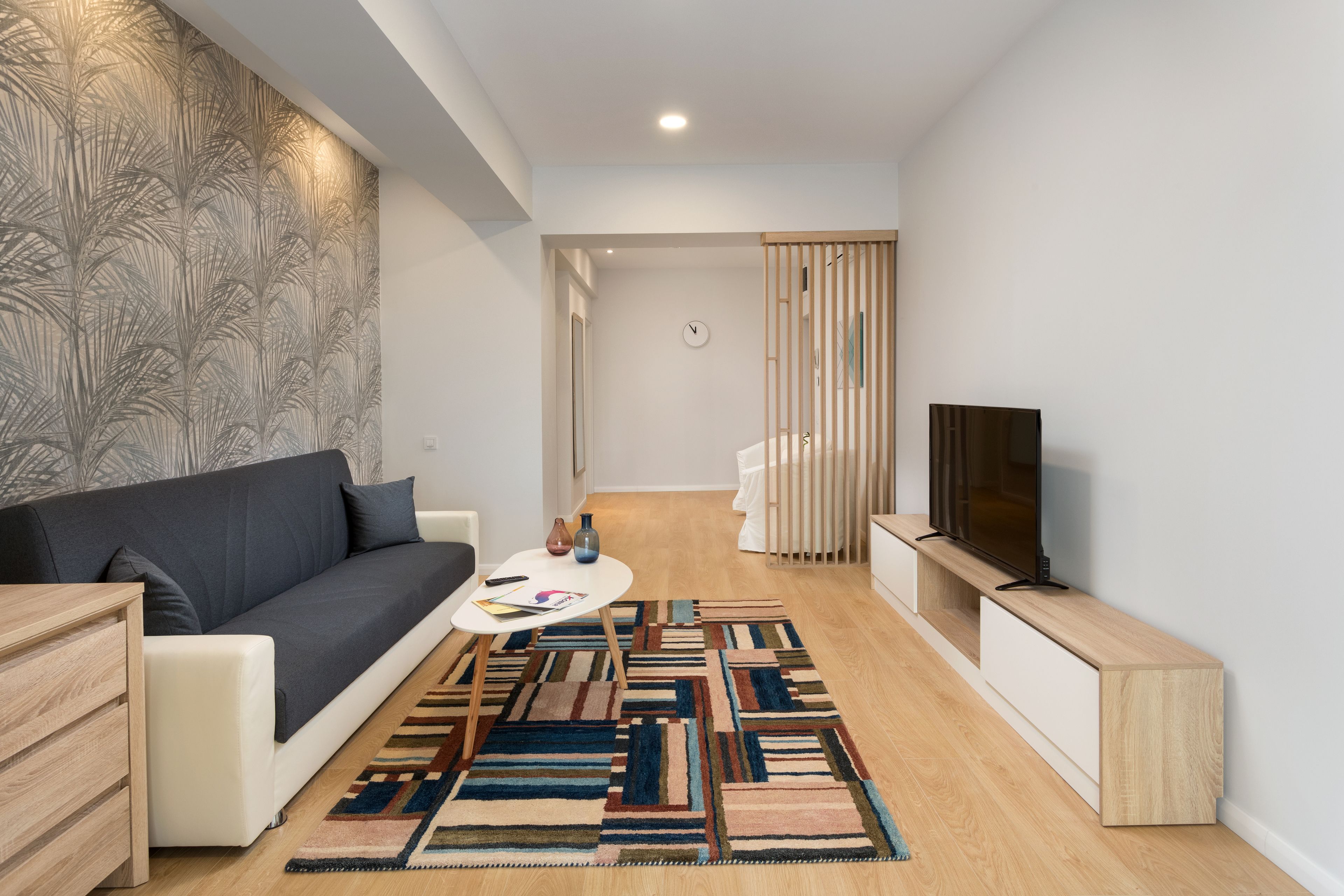 standard double room, balcony | living area | led tv