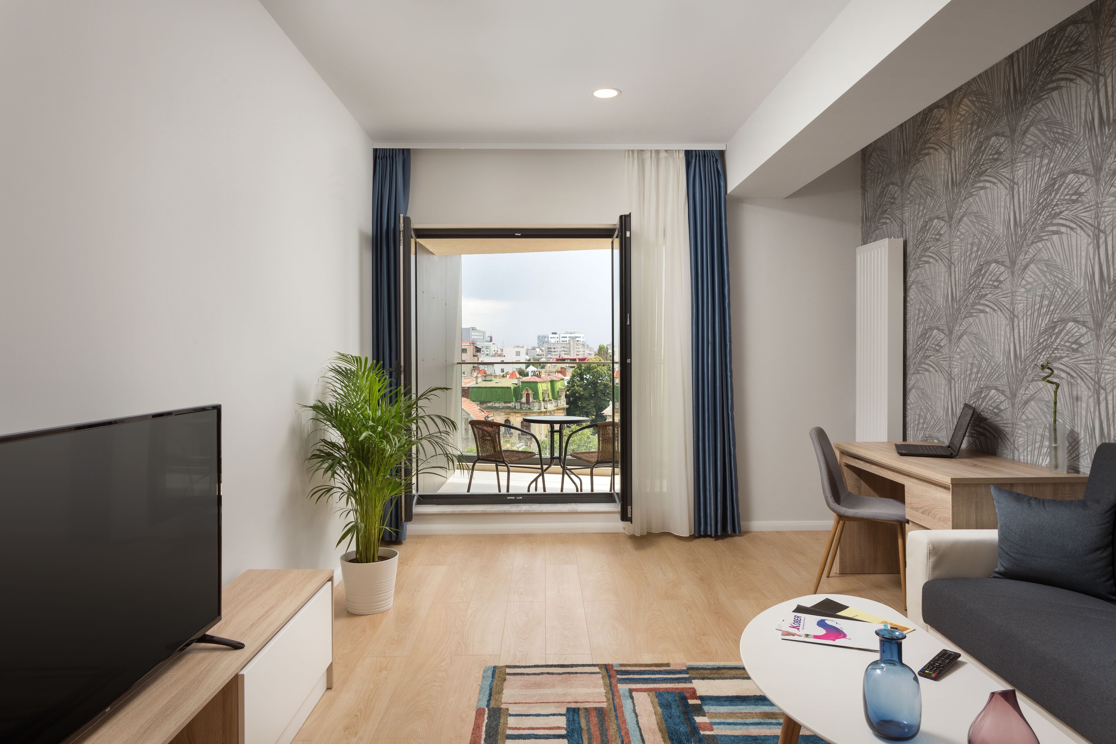 standard double room, balcony | living room | led tv