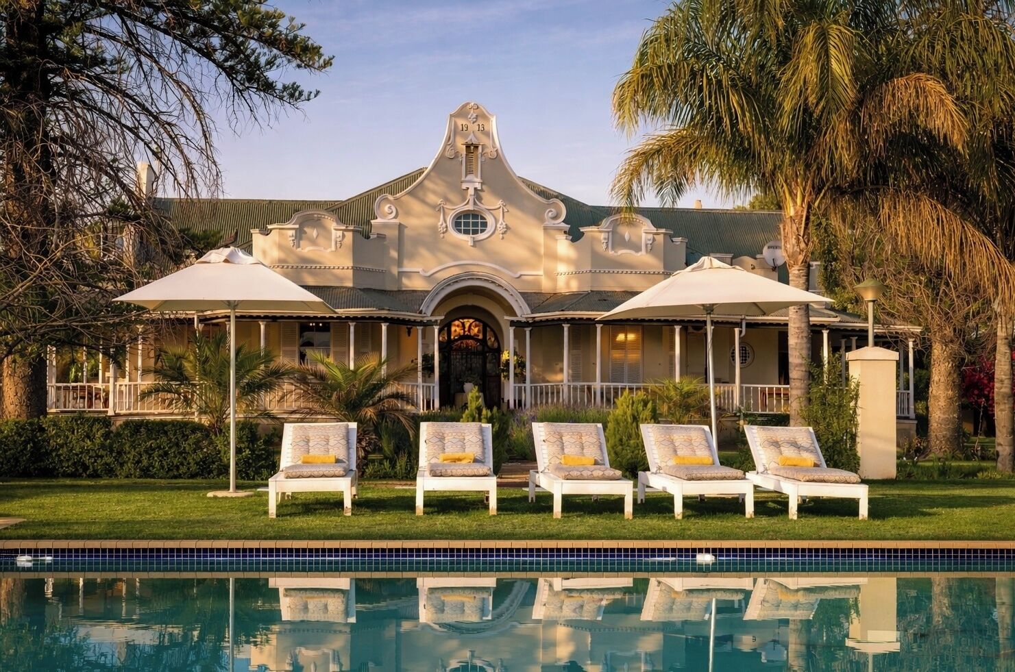 Outdoor pool, pool umbrellas, pool loungers