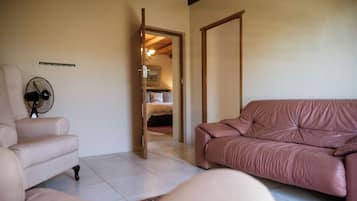 Family Suite, 2 Bedrooms, Garden View, Garden Area | Minibar, in-room safe, individually decorated, individually furnished