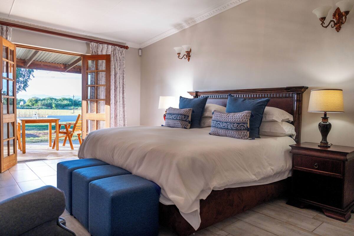 Suite familiar, 2 habitaciones, vista al jardín, en el área del jardín | Vista desde la habitación