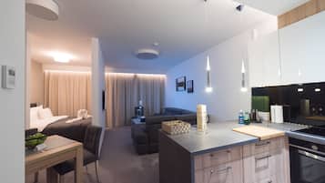 Economy Apartment, 1 Queen Bed, Non Smoking | 1 bedroom, premium bedding, minibar, in-room safe