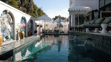 Outdoor pool, open 7:00 AM to 7:00 PM, sun loungers