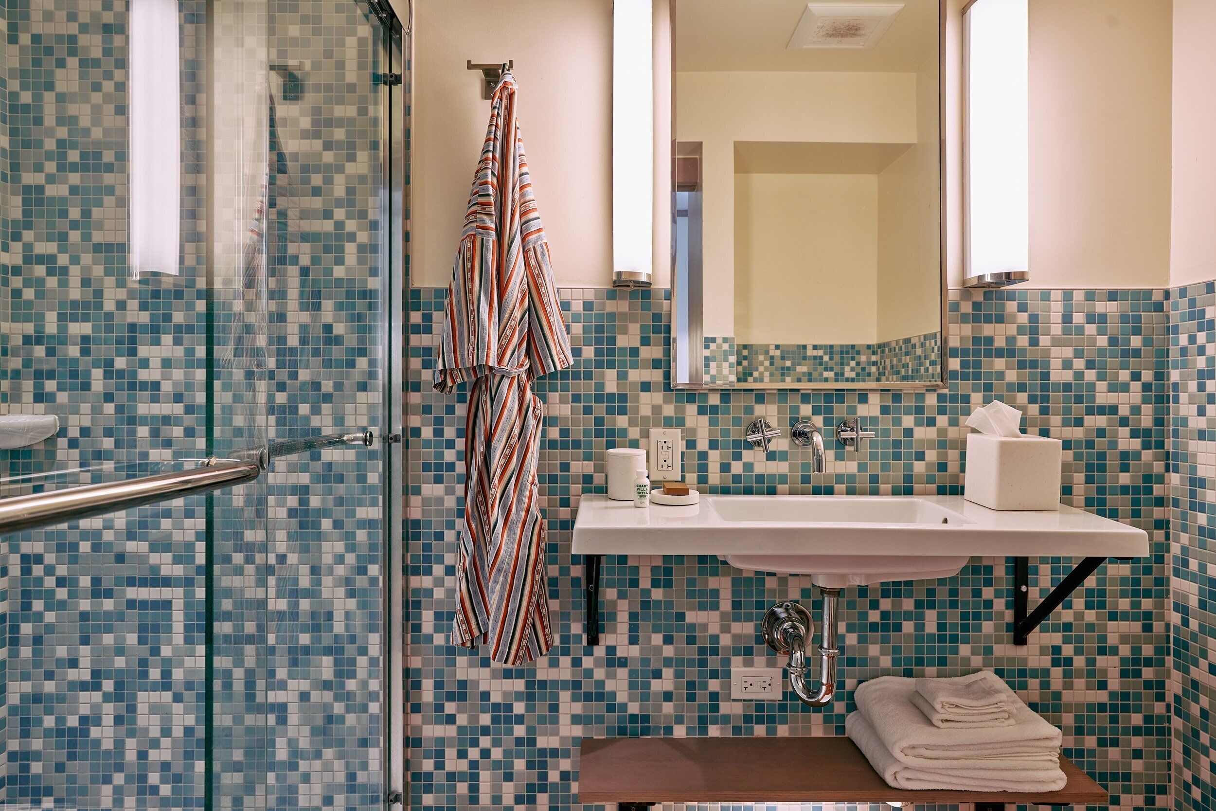 shower, rainfall showerhead, designer toiletries, hair dryer