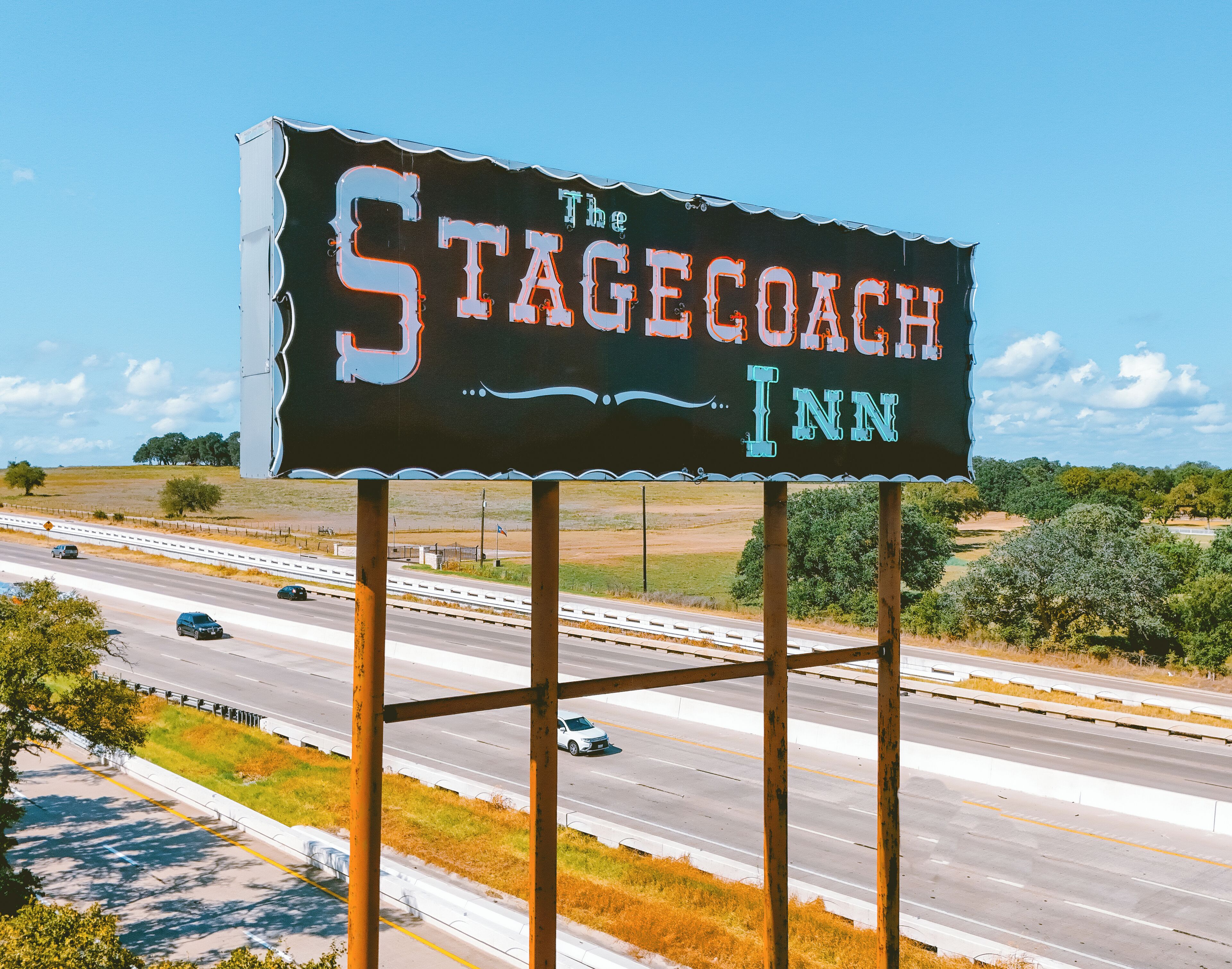 A billboard advertising The Stagecoach Inn.
