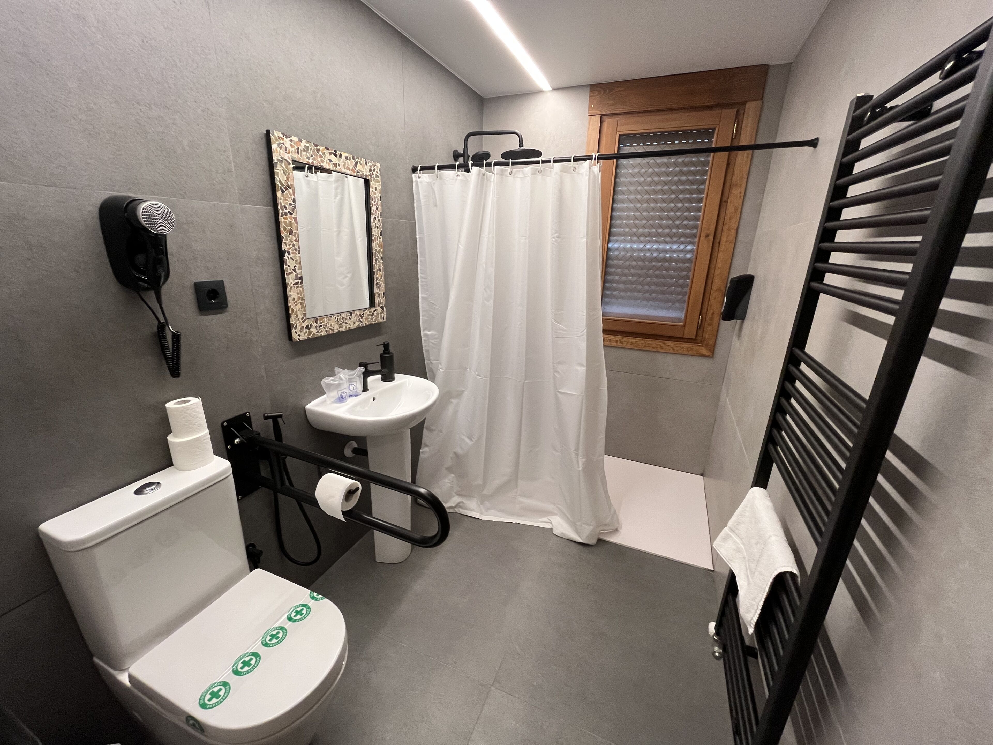 adapted single - 2 beds | bathroom | deep-soaking bathtub, rainfall showerhead, free toiletries, hair dryer