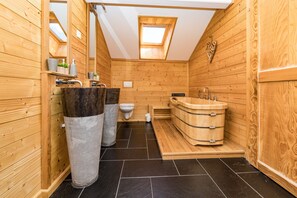 Bathtub, hair dryer, towels