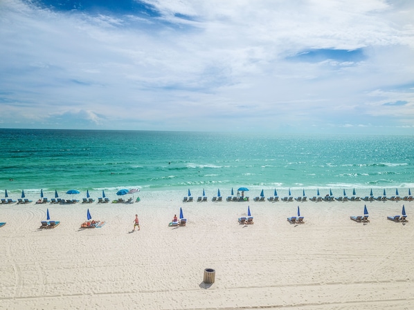 On the beach, sun loungers