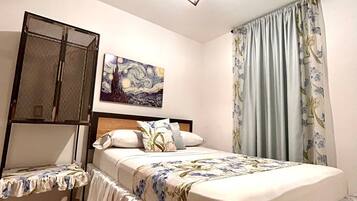 Rideaux occultants, chambres insonorisées, fer et planche à repasser