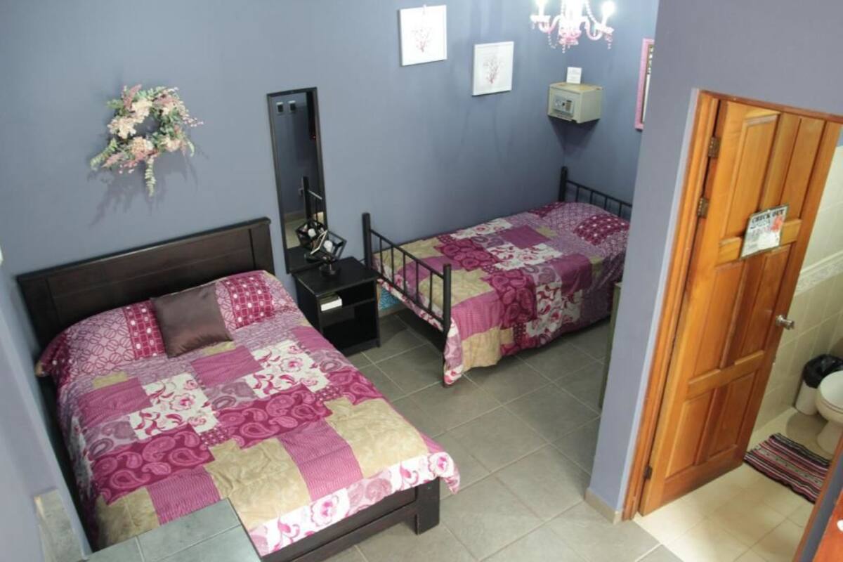 Triple Room | 2 bedrooms, in-room safe, iron/ironing board, bed sheets