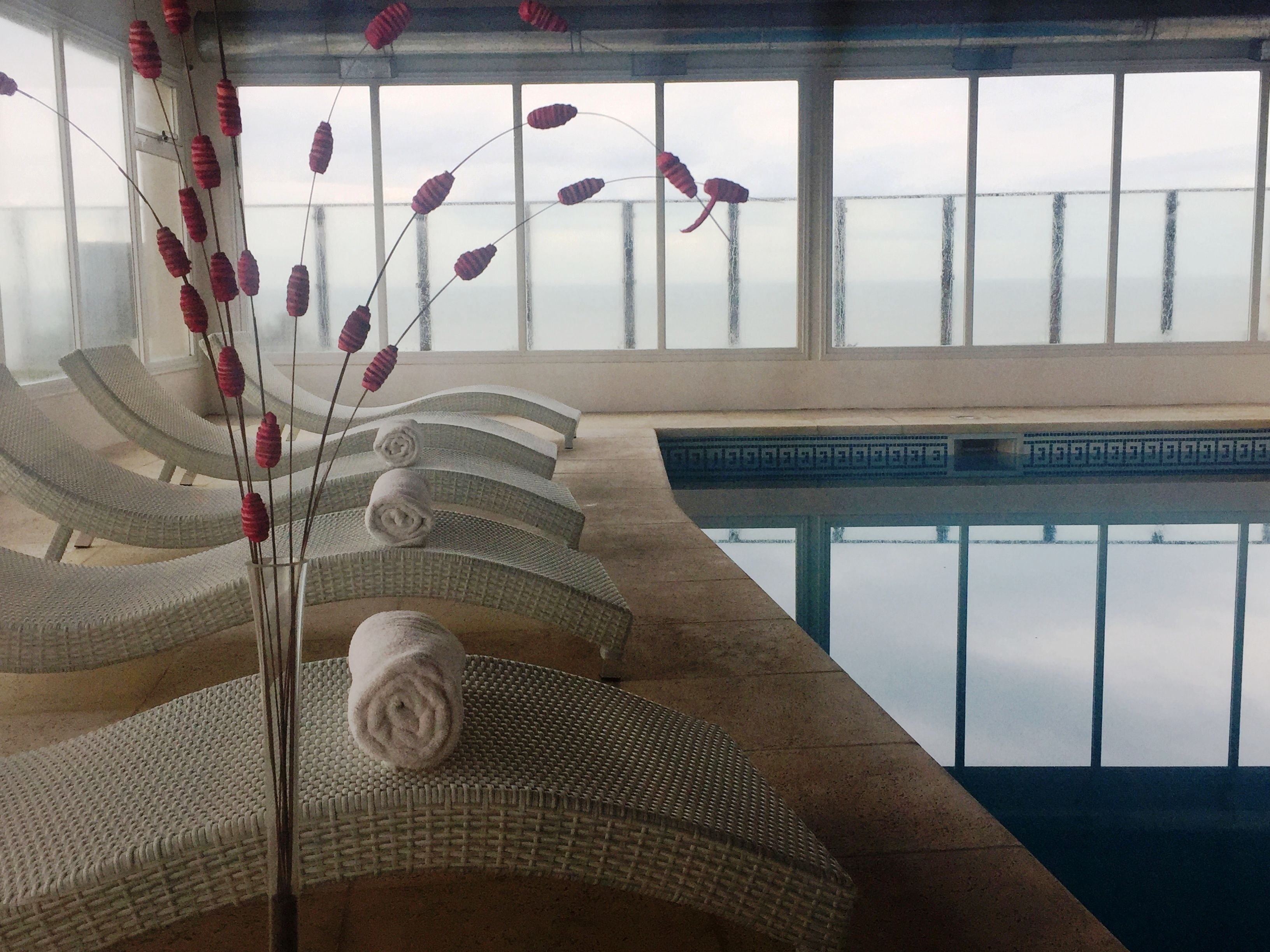 Indoor pool, seasonal outdoor pool, pool umbrellas, pool loungers