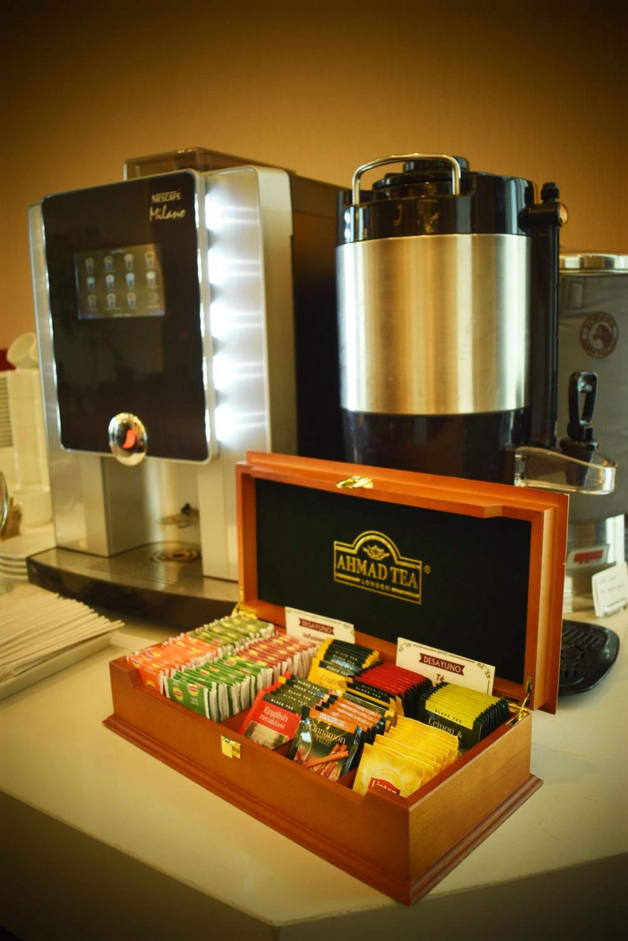 A coffee station with a selection of tea and coffee products.