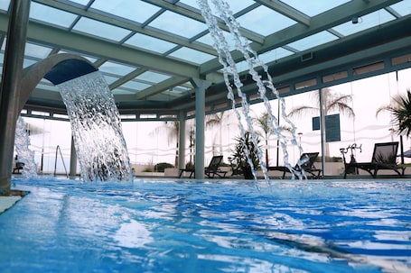 2 indoor pools, 4 outdoor pools, open 9:00 AM to 9:00 PM, pool umbrellas