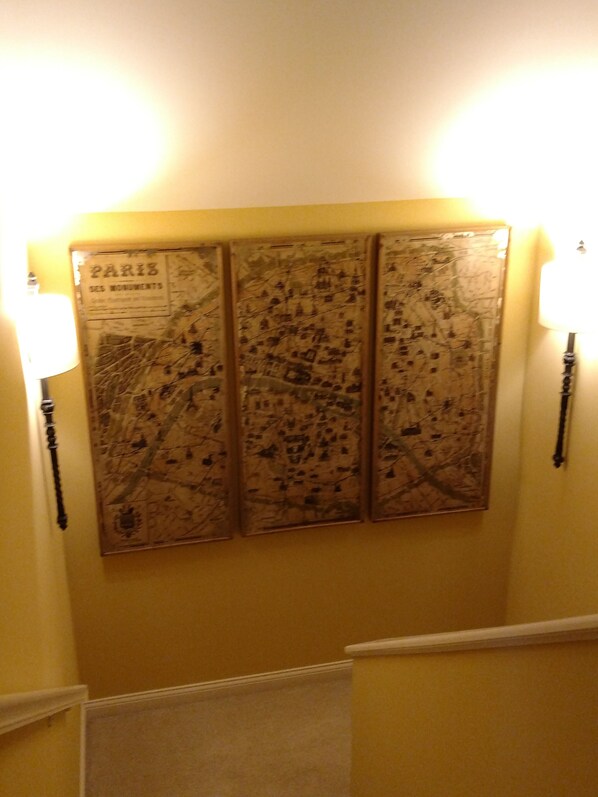 A wall with three large maps of Paris. - Butler Fieldhouse one block from Butler University and Hinkle Fieldhouse (Indianapolis)