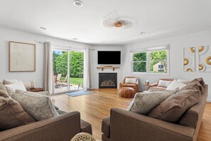 Smart TV, fireplace, table tennis, books