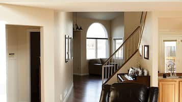 Flat-screen TV, fireplace, video games, DVD player