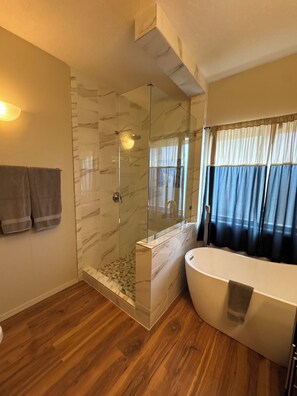 Shower, hair dryer, towels, soap