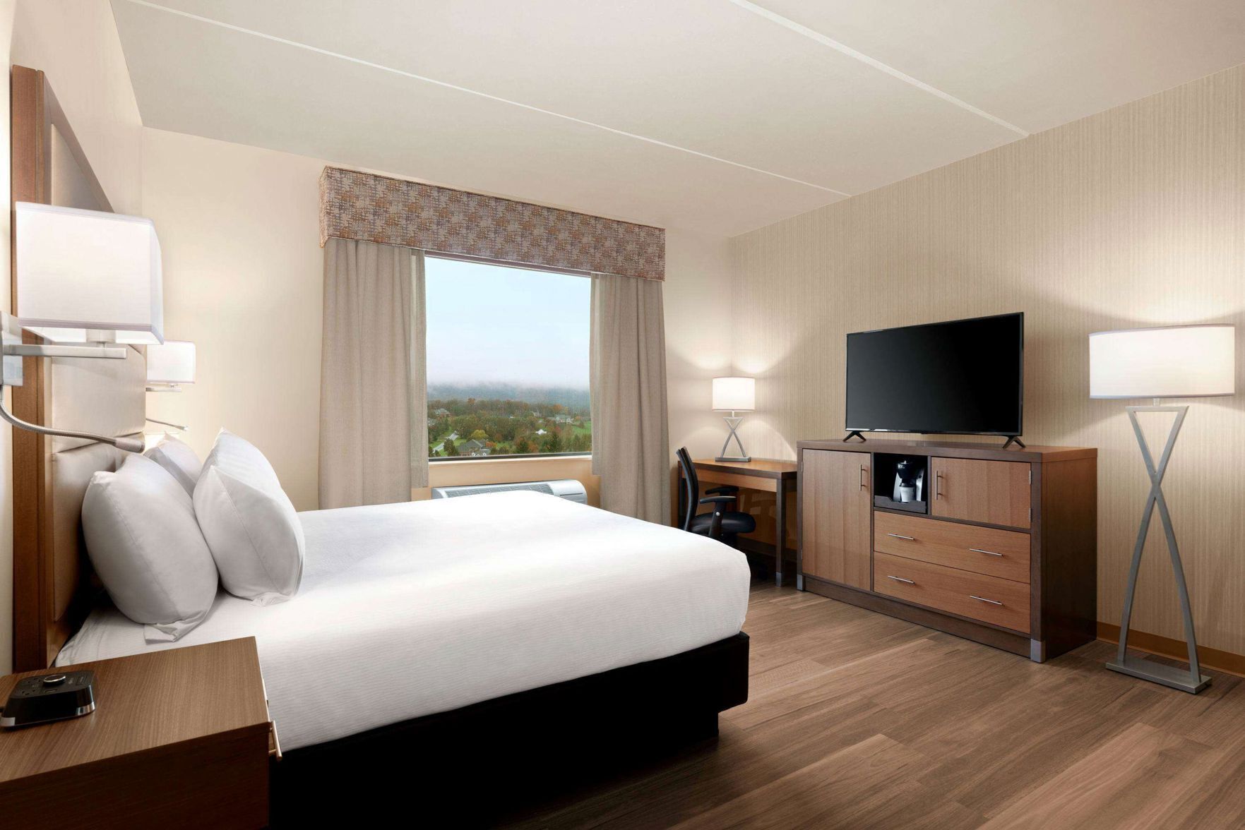 Hypo-allergenic bedding, in-room safe, desk, laptop workspace