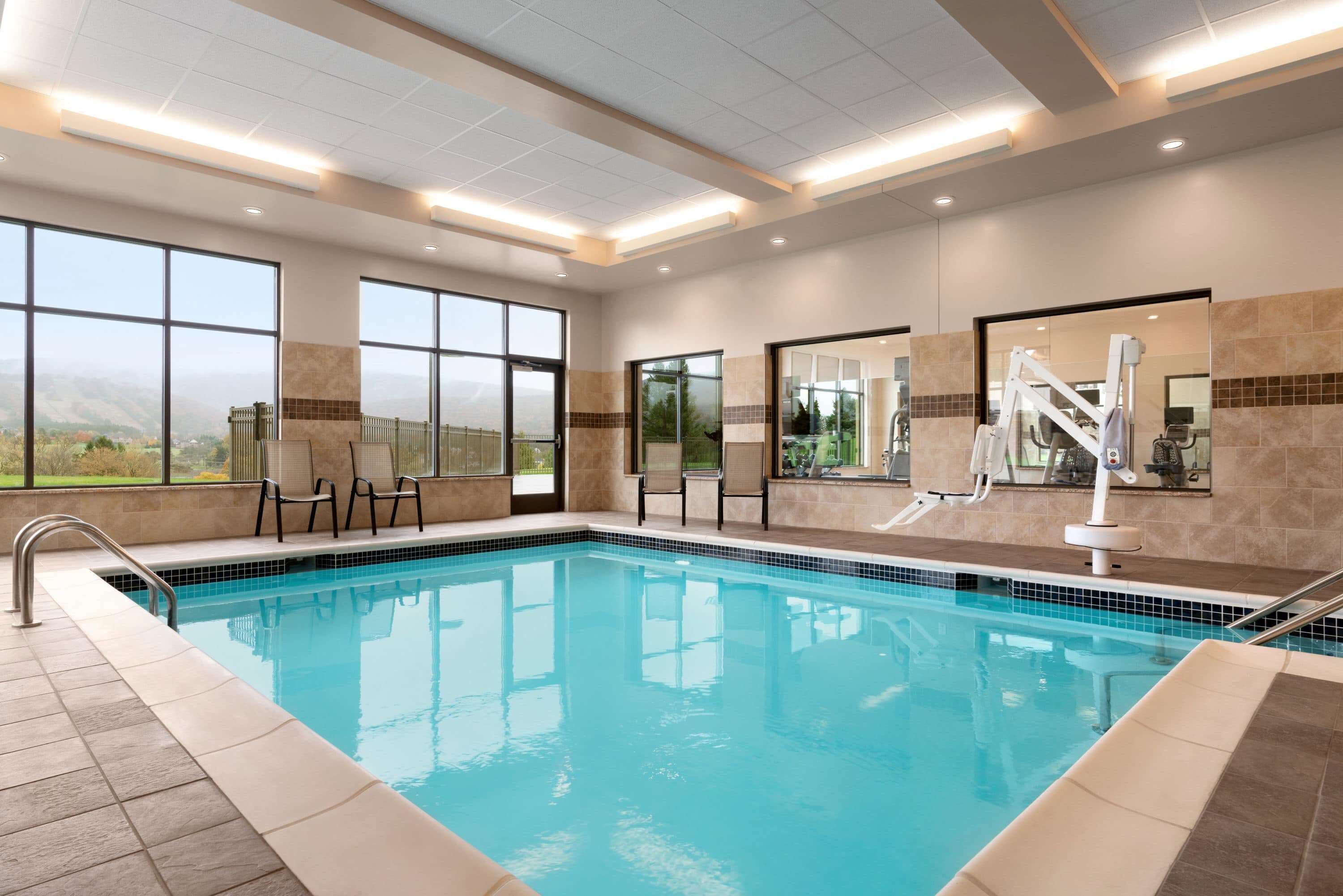 Indoor pool, outdoor pool, open 9:00 AM to 10:00 PM, pool loungers