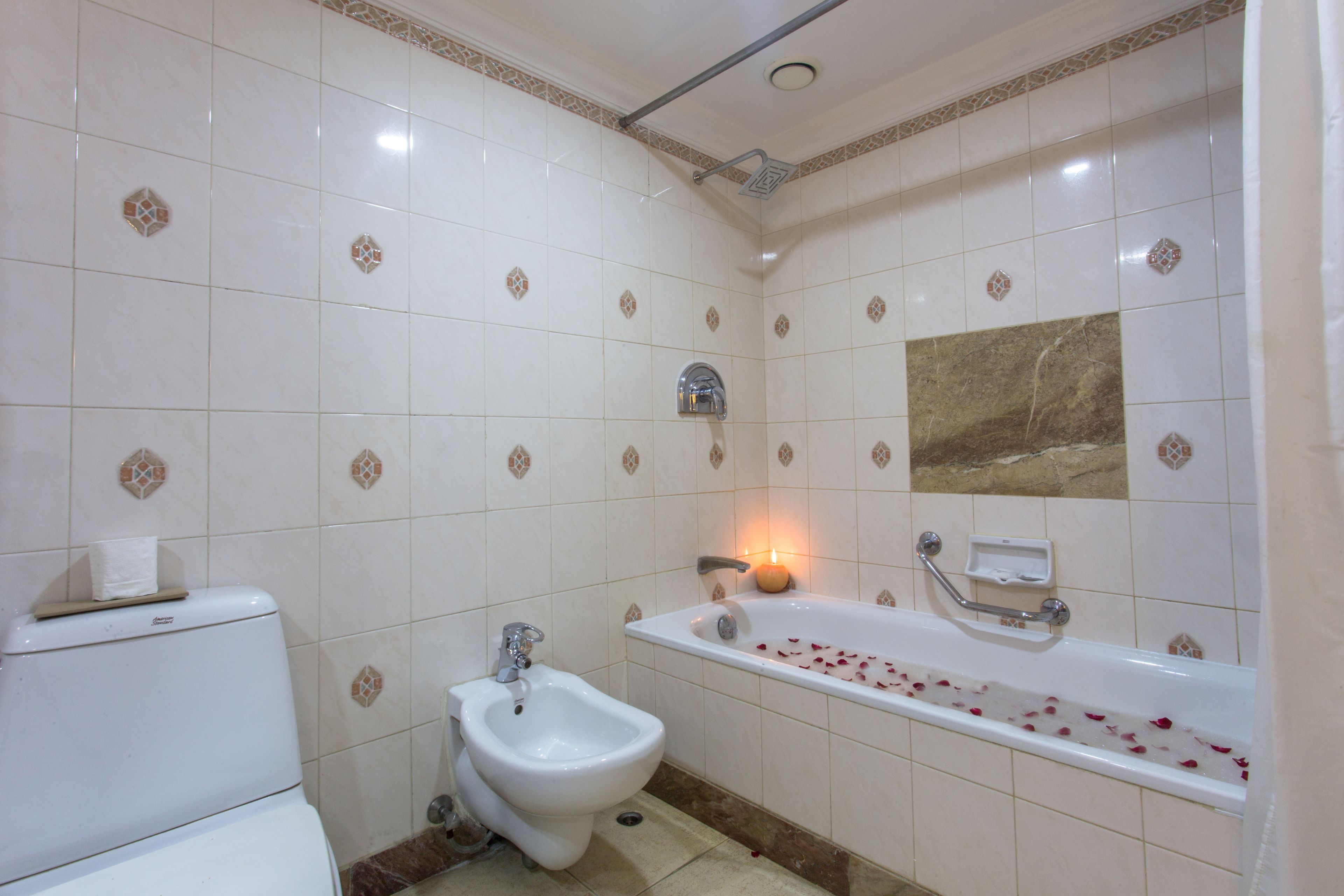 suite | bathroom | separate bathtub and shower, free toiletries, hair dryer, bathrobes