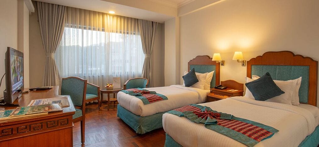 Deluxe-værelse med 2 enkeltsenge - ikke-ryger | Pengeskab på værelset, skrivebord, arbejdsområde til bærbare computere