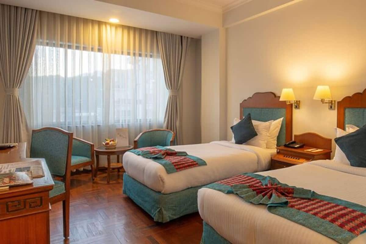 Deluxe-værelse med 2 enkeltsenge - ikke-ryger | Pengeskab på værelset, skrivebord, arbejdsområde til bærbare computere