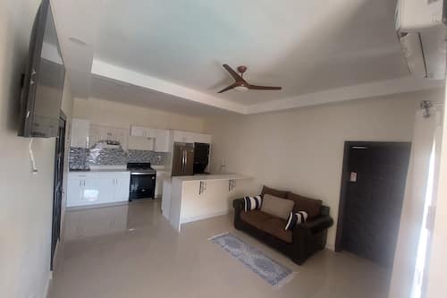 Standard Double Room, 2 Queen Beds | Private kitchen | Electric kettle, eco-friendly cleaning products, ice maker
